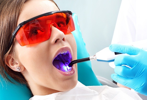 Girl receiving dental sealants