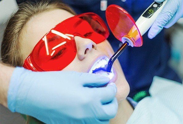 Patient receiving dental bonding