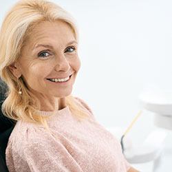 Woman smiling in dental chair