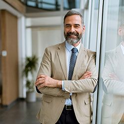 Man smiling in office