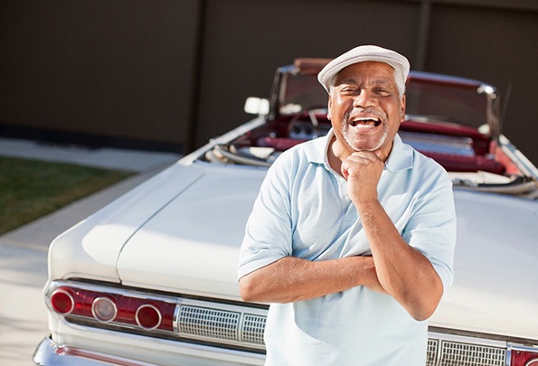 Man smiling after cost of dentures in Everett