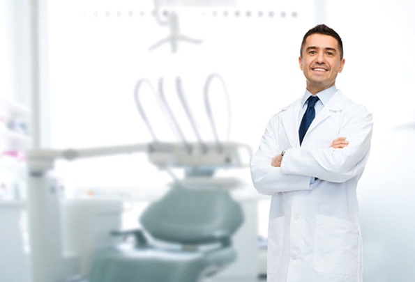 Dentist in modern dental office