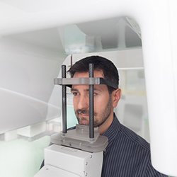 man getting a 3D CBCT scan as implant technology in Everett