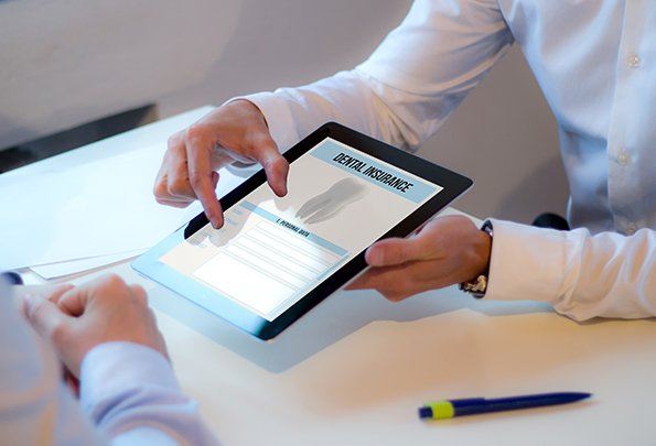 Dental insurance forms on tablet computer