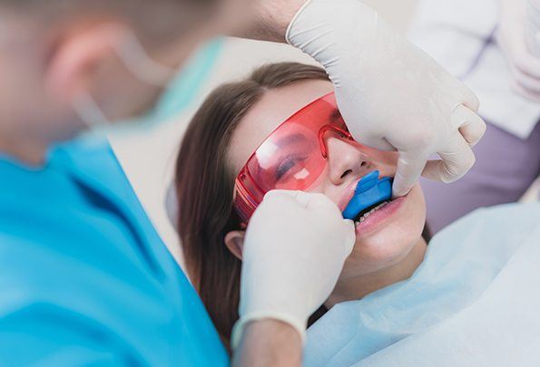 Patient receiving fluoride treatment