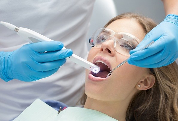 Dentist capturing intraoral images