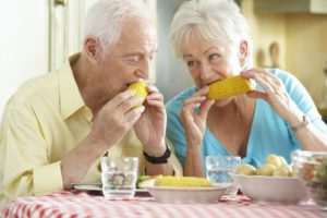 older couple eating summer foods