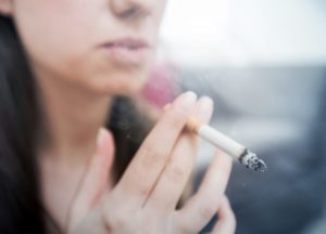 woman smoking a cigarette